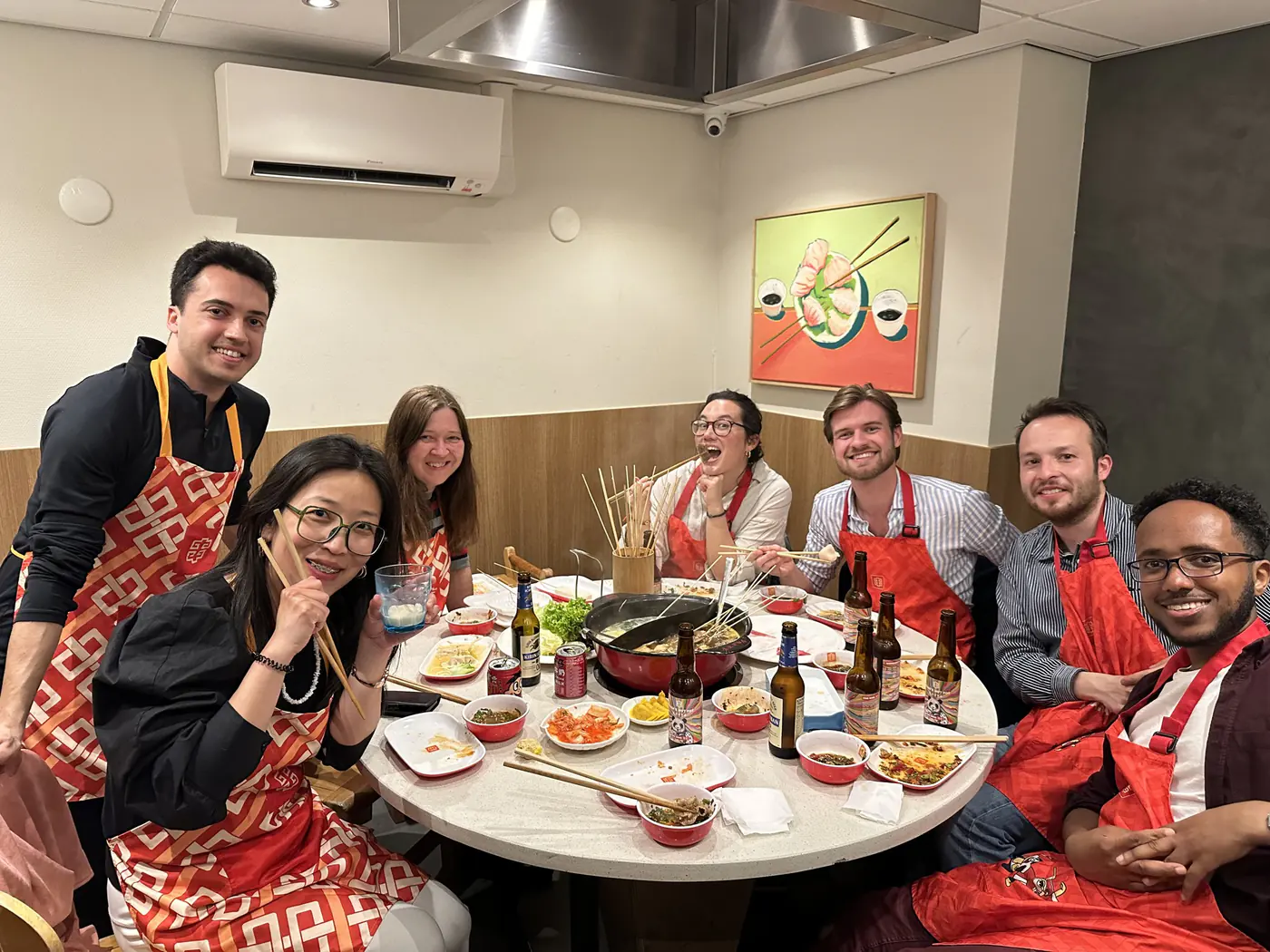 Chinese culture: friends sharing a hotpot dinner